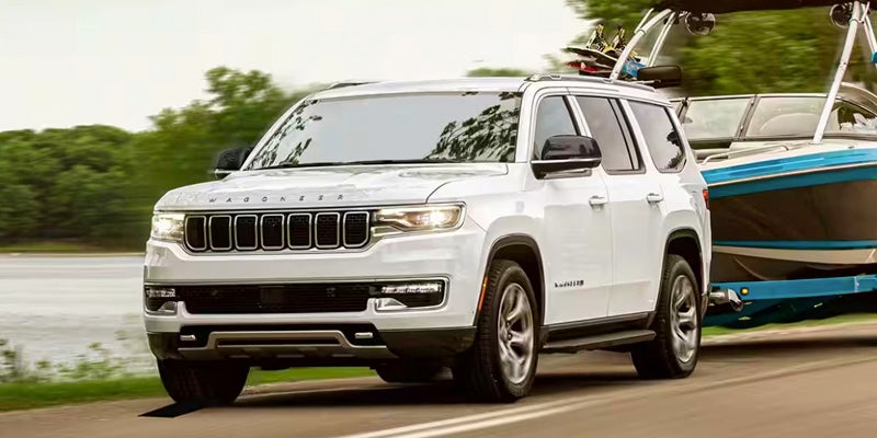 A 2024 Jeep Wagoneer towing a boat near Pleasanton, TX